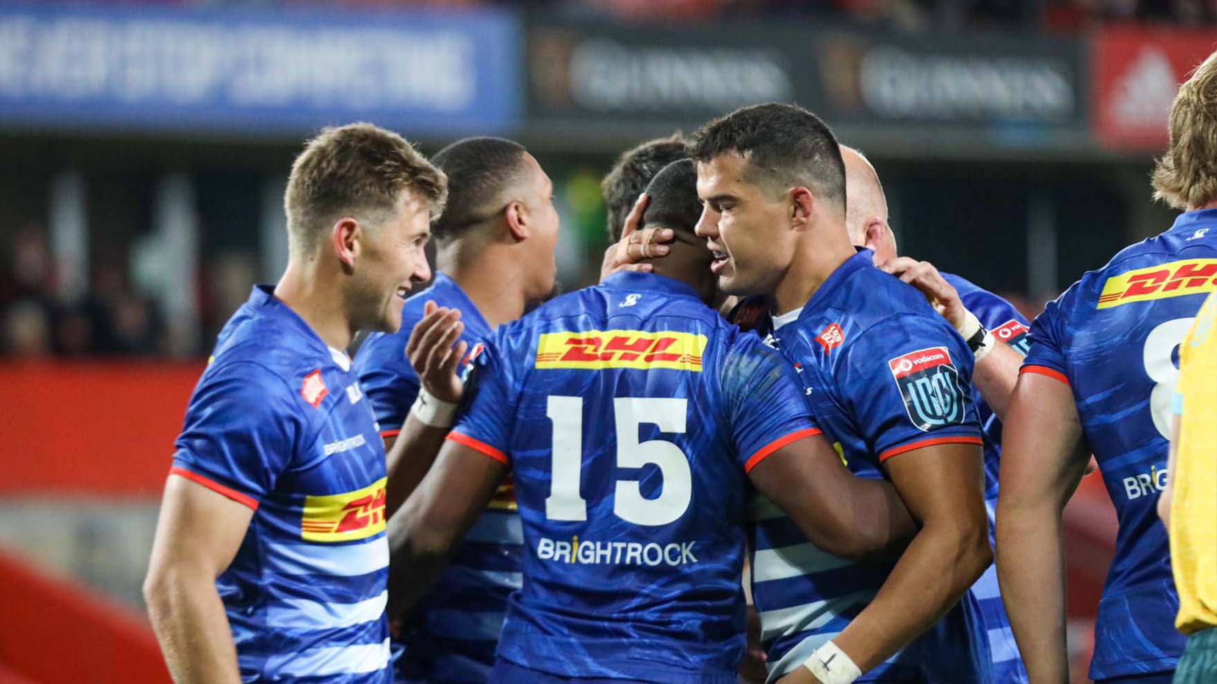 Stormers players huddle after scoring a try