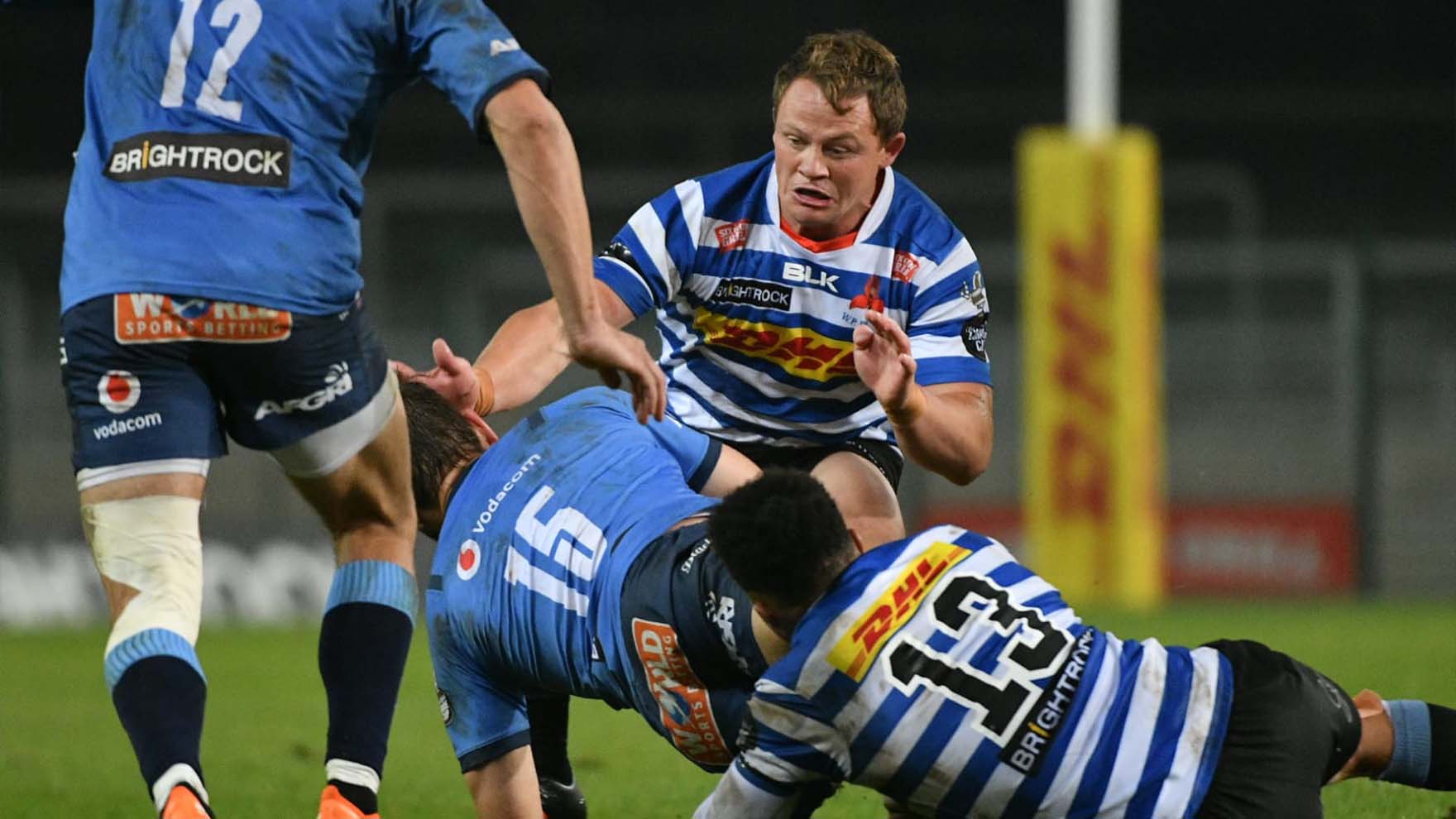 Deon Fourieof Western Province tackling a Blue Bulls player during the Currie Cup tournament